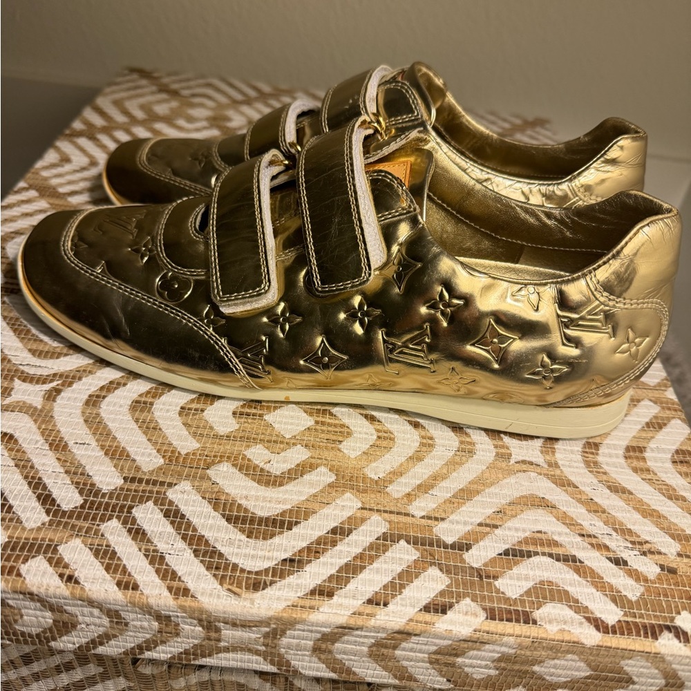 Louis Vuitton gold monogram empreinte sneakers